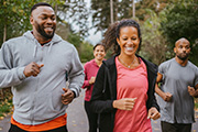 Four people jogging